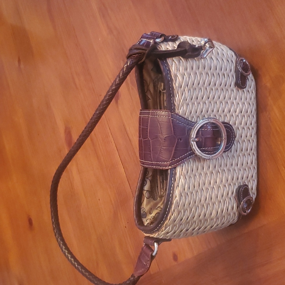 Brighton woven straw purse with brown leather trim.